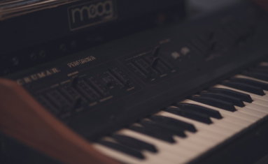 Crumar Performer keyboard below a Moog synthesizer